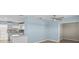 Open floorplan living area shows connection to the kitchen at 12400 Park Blvd # 210, Seminole, FL 33772