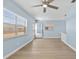 Bright living room with new floors and paint at 12400 Park Blvd # 210, Seminole, FL 33772