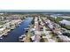 Waterfront community with homes along a canal, offering boat docks and access to open waters at 12700 5Th Isle, Hudson, FL 34667