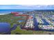 Aerial view of waterfront neighborhood with direct access to open water, perfect for boating and enjoying coastal living at 12700 5Th Isle, Hudson, FL 34667
