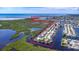 Aerial view of waterfront neighborhood with direct access to open water, perfect for boating and enjoying coastal living at 12700 5Th Isle, Hudson, FL 34667