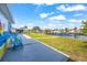 Outdoor patio overlooking the canal on a sunny day at 12700 5Th Isle, Hudson, FL 34667