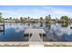 Waterfront home featuring a private dock with easy access to the open water at 12700 5Th Isle, Hudson, FL 34667