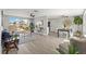 Bright and airy living room with stylish furnishings and a serene water view at 12700 5Th Isle, Hudson, FL 34667