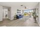 Elegant living room featuring stylish seating, views of the water, and contemporary accents at 12700 5Th Isle, Hudson, FL 34667