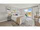 Bright bedroom with sliding glass doors and a water view at 12700 5Th Isle, Hudson, FL 34667