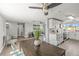 Spacious open-concept layout showcasing the dining area, living room, and kitchen at 12700 5Th Isle, Hudson, FL 34667