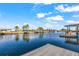 Beautiful waterfront view from a dock with waterfront homes across the canal at 12700 5Th Isle, Hudson, FL 34667