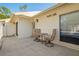 Condo patio featuring a table and chairs at 1300 Shady Pine Way # B, Tarpon Springs, FL 34688