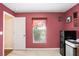 Bright bedroom featuring neutral carpet, a closet and walls painted in a distinctive mauve shade at 13411 Graham Yarden Dr, Riverview, FL 33579