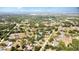 Scenic aerial shot showcases the lush community, highlighting the beautiful landscape and residential properties at 1350 Mustang St, Nokomis, FL 34275