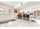 Bright kitchen boasts stainless steel appliances, ample counter space, and white cabinetry at 1350 Mustang St, Nokomis, FL 34275