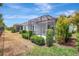 This property offers a screened lanai, lush lawn, landscaping and mature trees in a peaceful backyard setting at 13518 Circa Crossing Dr, Lithia, FL 33547
