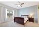 Bedroom with natural light, hardwood floor, and furnishings at 13518 Circa Crossing Dr, Lithia, FL 33547