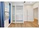 Bedroom with natural light, neutral paint, and hardwood floors, closet at 13518 Circa Crossing Dr, Lithia, FL 33547