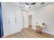 Bedroom with natural light, neutral paint, and hardwood floors at 13518 Circa Crossing Dr, Lithia, FL 33547