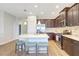 Contemporary kitchen with stainless steel appliances, abundant storage, and a center island at 13518 Circa Crossing Dr, Lithia, FL 33547