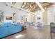 Clubhouse lounge with seating, tv, tables, lighting and white and beige interior at 13518 Circa Crossing Dr, Lithia, FL 33547