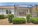 Enjoy this screened in lanai, perfect for outdoor entertaining with a ceiling fan and ample space for dining at 13518 Circa Crossing Dr, Lithia, FL 33547