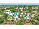 Overhead view of a large community pool with area and lap pool near a clubhouse at 13518 Circa Crossing Dr, Lithia, FL 33547