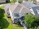 Stylish home with a quaint balcony and verdant landscaping, ideal for enjoying quiet moments outdoors at 14204 Barrington Stowers Dr, Lithia, FL 33547