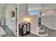Bright entryway with decor and stairs to the living area at 14204 Barrington Stowers Dr, Lithia, FL 33547