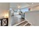 Cozy living room with hardwood floors, lots of natural light, and neutral decor at 14204 Barrington Stowers Dr, Lithia, FL 33547
