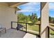 Covered patio with metal railing and a scenic view of a lush, green lawn at 14204 Barrington Stowers Dr, Lithia, FL 33547