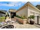 Back patio with outdoor seating area, fire pit, and attractive landscaping and lighting at 14204 Barrington Stowers Dr, Lithia, FL 33547