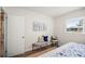 Bright bedroom featuring stylish decor, natural light, and a relaxing atmosphere at 14330 Oliver St, Largo, FL 33774