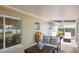 Screened patio with cozy furniture, ideal for outdoor entertaining and relaxation at 14330 Oliver St, Largo, FL 33774