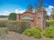Brick community entrance sign for Trillium, surrounded by lush landscaping and greenery at 15579 Stone House Dr, Brooksville, FL 34604