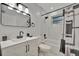 Stylishly updated bathroom with modern fixtures and finishes at 15591 Darien Way, Clearwater, FL 33764