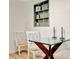 Cozy dining area with glass table and stylish decor at 15591 Darien Way, Clearwater, FL 33764
