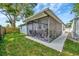 An inviting screened porch adds outdoor living space at 15591 Darien Way, Clearwater, FL 33764