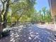 Spacious wooden back deck with picnic table and a wooded view offers an outdoor living space at 16224 Iola Woods Trl, Dade City, FL 33523