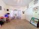 Bedroom with a reading nook and shelving for books at 16224 Iola Woods Trl, Dade City, FL 33523