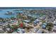 See this property in the context of the surrounding neighborhood and its canals in this aerial view at 1905 1St St, Indian Rocks Beach, FL 33785