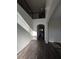 Welcoming foyer with wood-look floors and soaring ceilings at 19314 Long Lake Ranch Blvd, Lutz, FL 33558