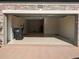 Spacious two-car garage with epoxy floors and ample storage space at 19314 Long Lake Ranch Blvd, Lutz, FL 33558