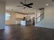 Bright and spacious living area featuring a modern kitchen with stainless steel appliances at 19314 Long Lake Ranch Blvd, Lutz, FL 33558