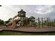 Community playground with slides, climbing structures, and a safety surface at 19314 Long Lake Ranch Blvd, Lutz, FL 33558