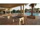 Community pool area featuring ping pong, foosball, and lounge seating at 19314 Long Lake Ranch Blvd, Lutz, FL 33558