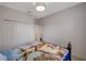 The bedroom offers a closet and an open doorway to another room at 2218 Valterra Vista Way, Valrico, FL 33594