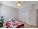 Bedroom view showcasing a closet and doorway at 2218 Valterra Vista Way, Valrico, FL 33594