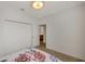 Bright bedroom with a closet and a door to the bathroom at 2218 Valterra Vista Way, Valrico, FL 33594