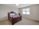 Bedroom with a large window allowing natural light in the room at 2218 Valterra Vista Way, Valrico, FL 33594