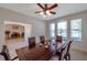 Elegant dining room with natural light, connecting to the office and offering a spacious feel at 2218 Valterra Vista Way, Valrico, FL 33594