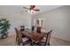 Formal dining room with a ceiling fan and a view into the living room at 2218 Valterra Vista Way, Valrico, FL 33594