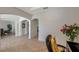 Open entryway with neutral tile, archways, and access to a dining room and other rooms at 2218 Valterra Vista Way, Valrico, FL 33594